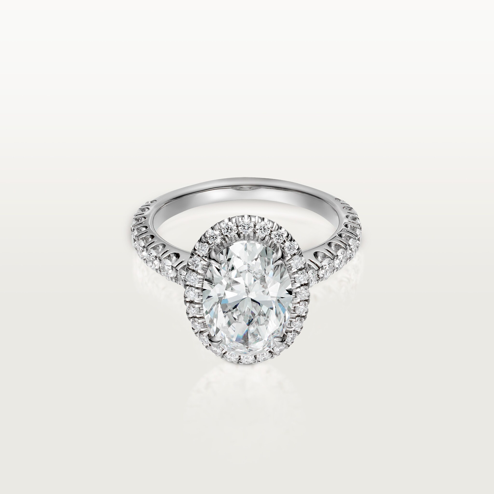 Cartier Destin&eacute;e solitaire, oval-cut diamond, paved 