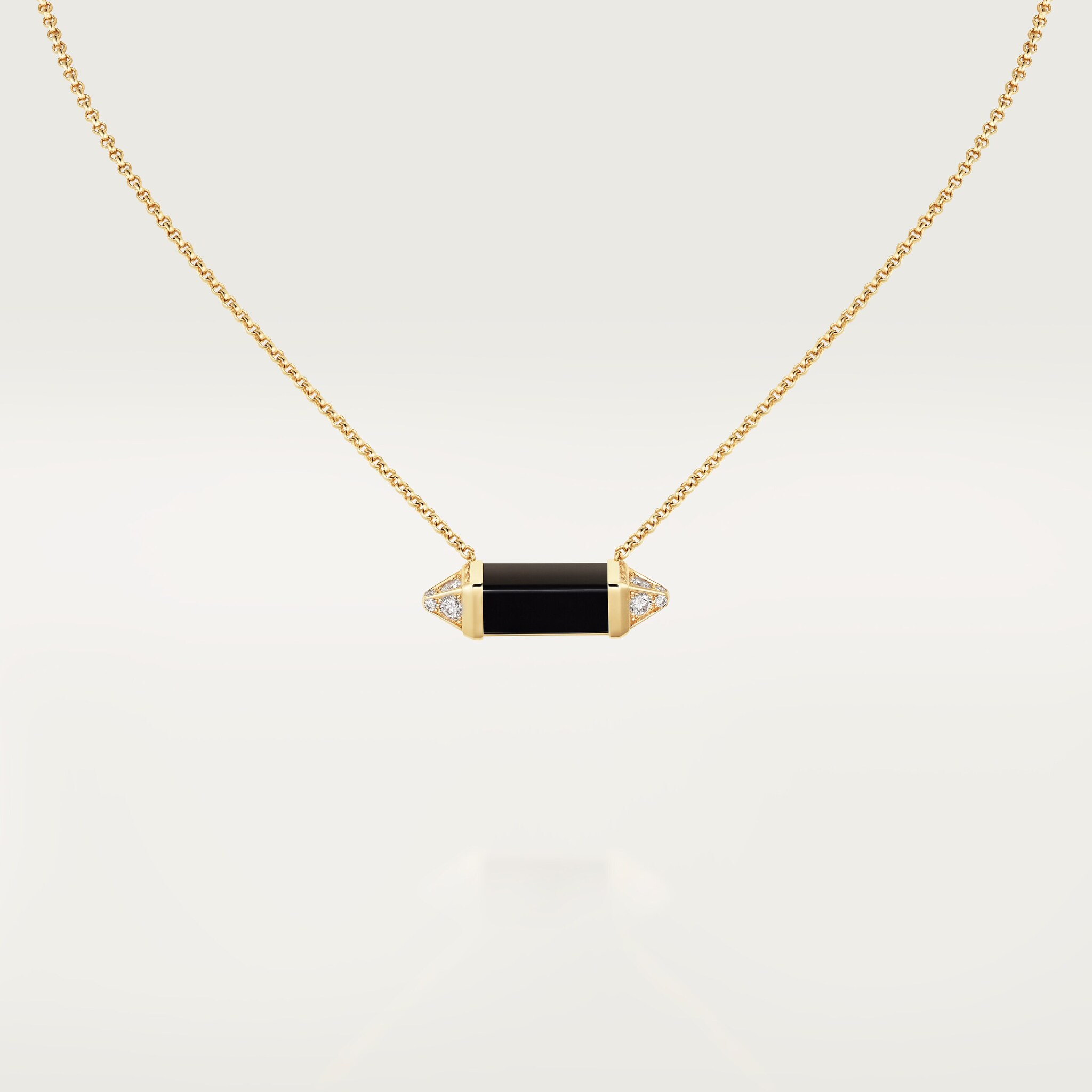 حلية متدلّية من مجموعة "لي بيرلانغو دو كارتييه"، مرصوفة جزئيًا