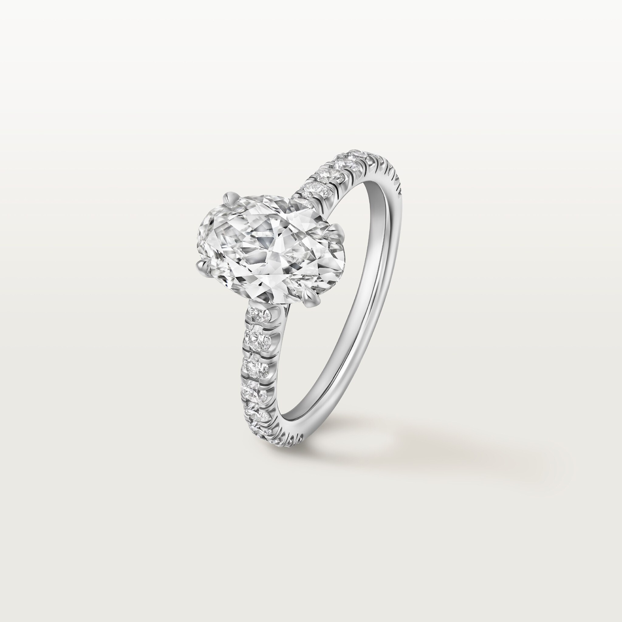 1895 solitaire, oval-cut diamond, paved 