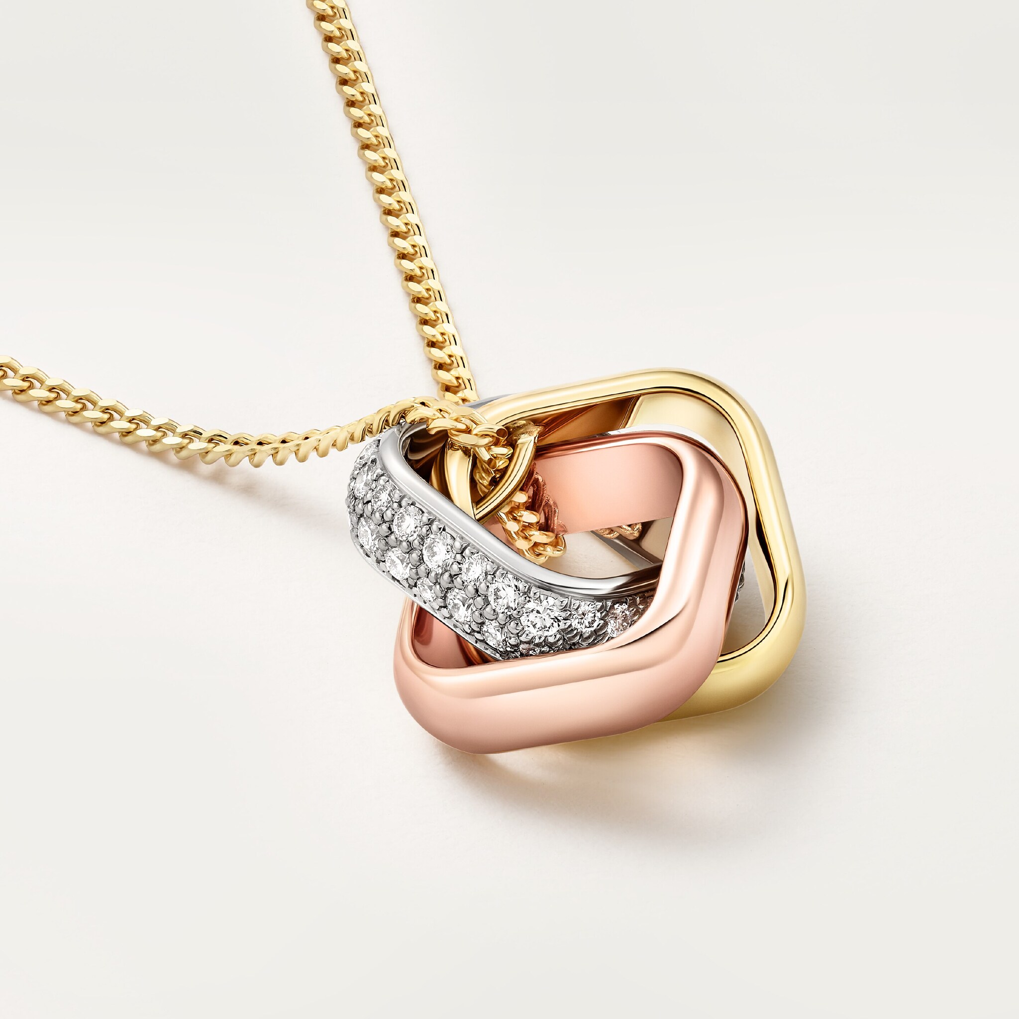 Trinity pendant, cushion-shaped, half-paved