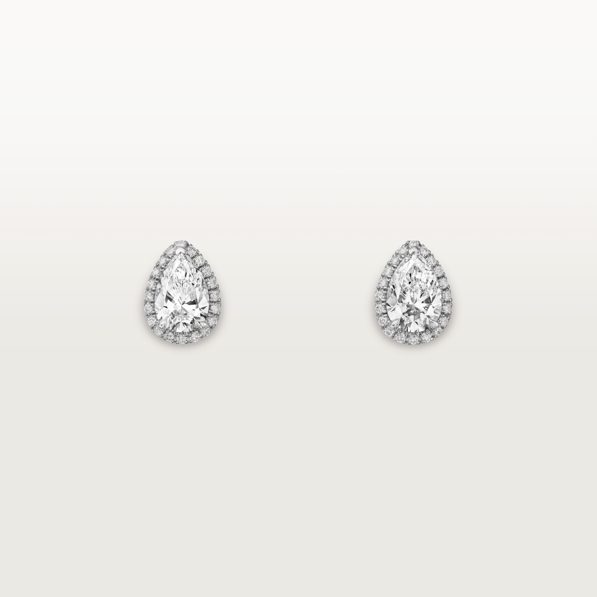 Cartier Destin&eacute;e stud earrings, 2 pear-shaped diamonds, paved