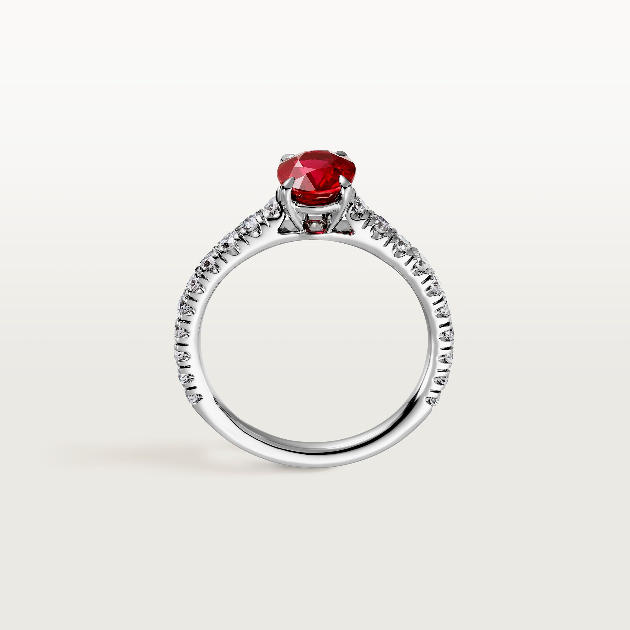 1895 solitaire, oval-cut ruby, paved 