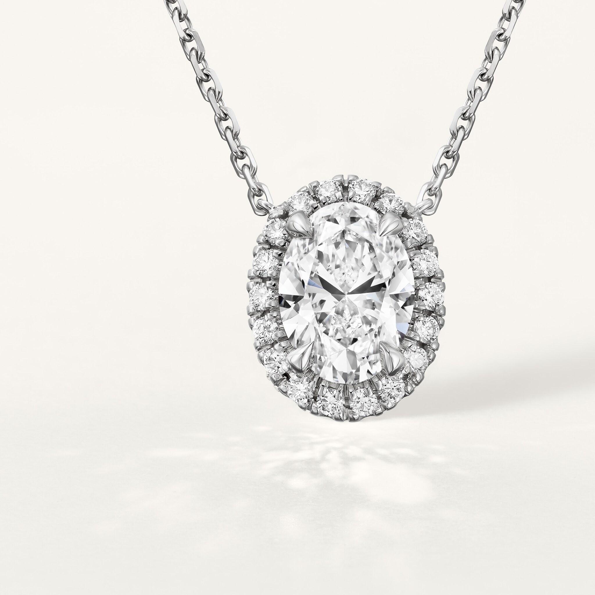 Cartier Destin&eacute;e pendant, oval-cut diamond, paved 