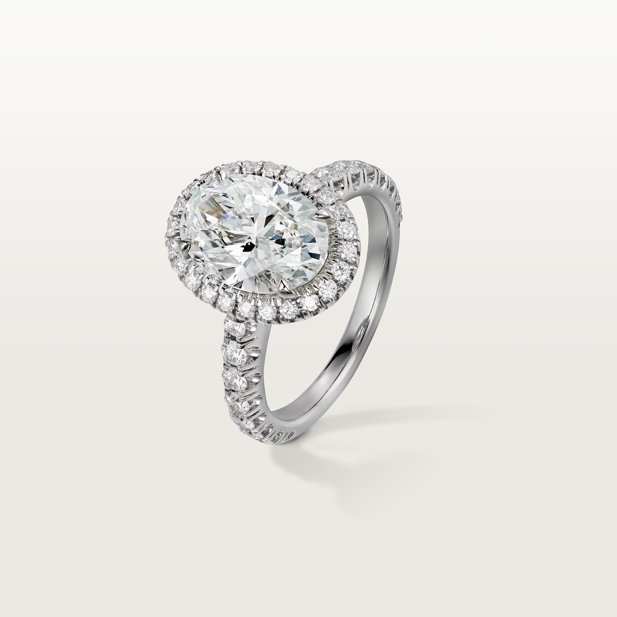 Cartier Destin&eacute;e solitaire, oval-cut diamond, paved 