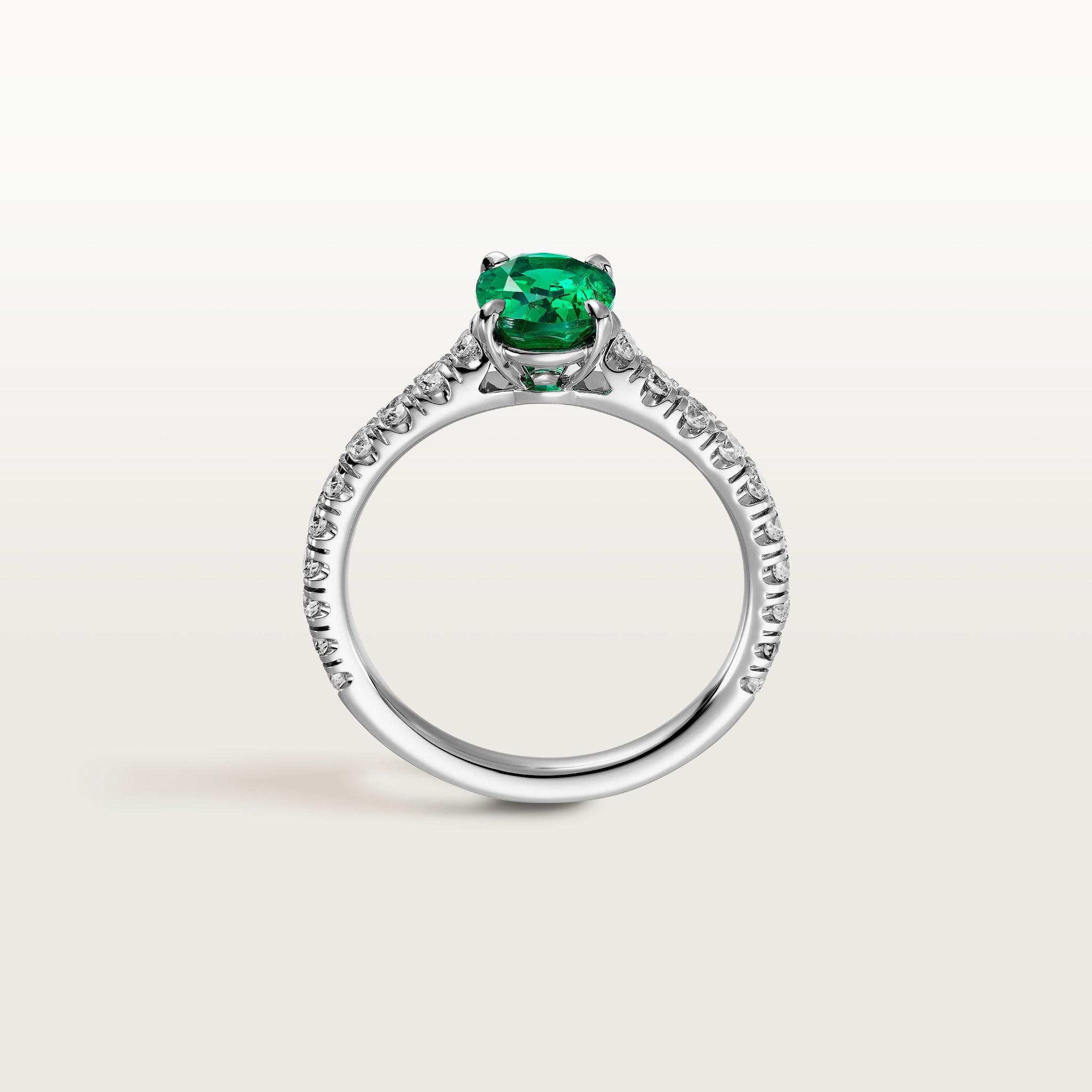 1895 solitaire, oval-cut emerald, paved 