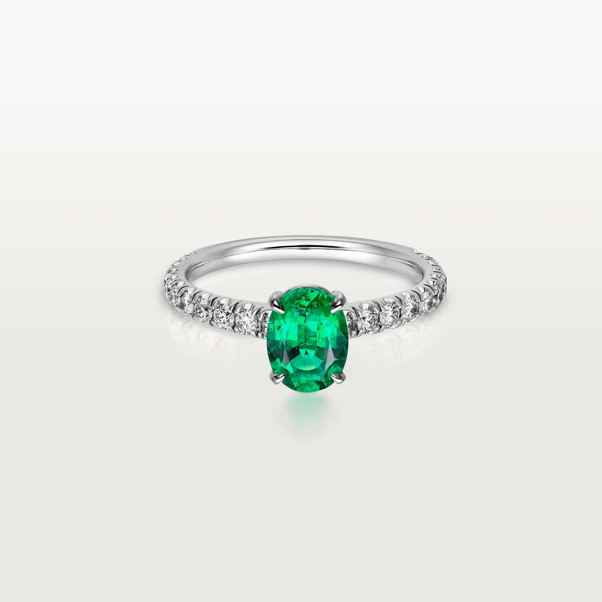 1895 solitaire, oval-cut emerald, paved 
