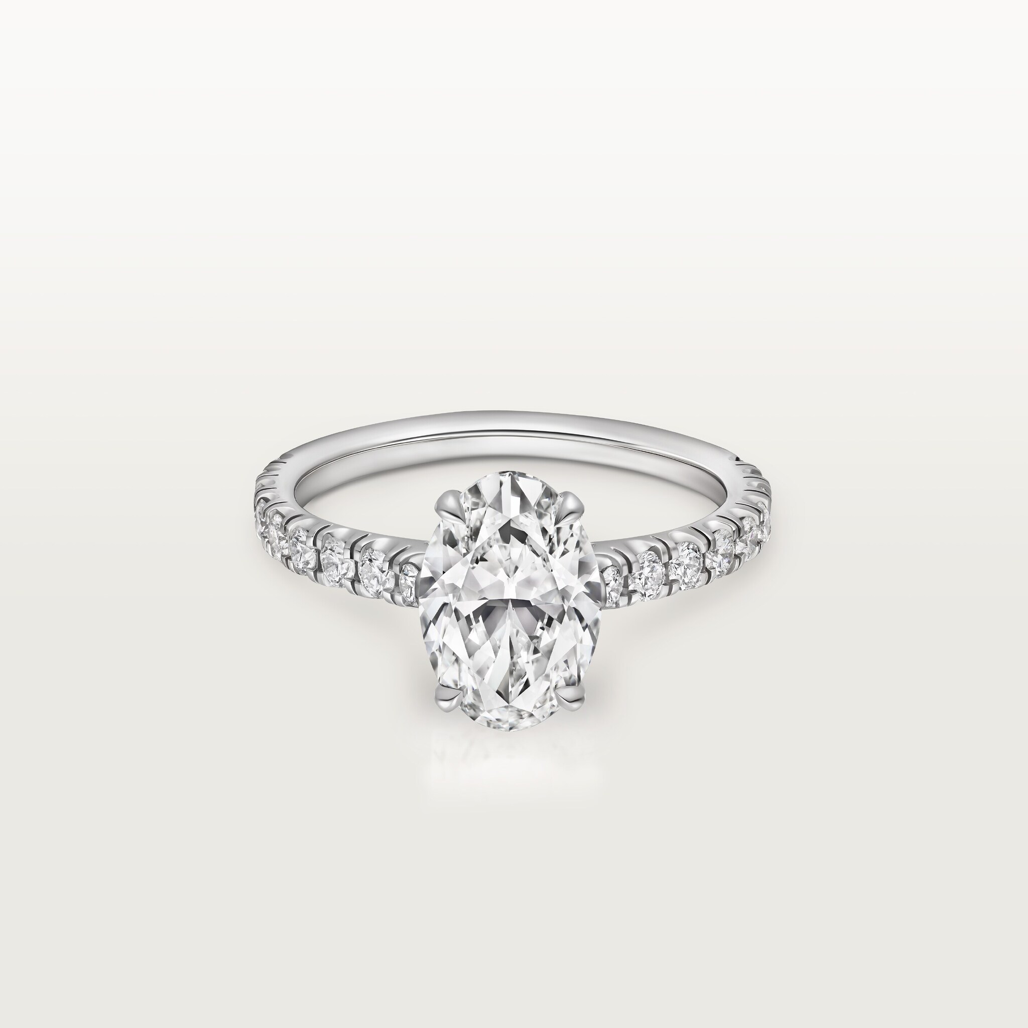 1895 solitaire, oval-cut diamond, paved 