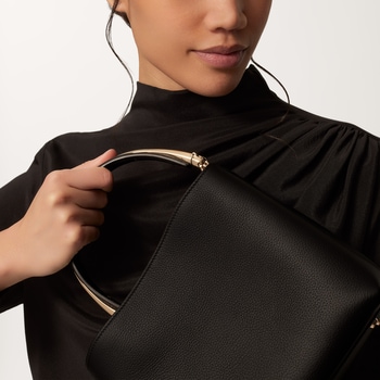 Small model handle bag, Panthère Double de Cartier Small model handle bag, Panthère Double de Cartier