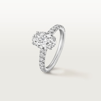 1895 solitaire, oval-cut diamond, paved  1895 solitaire, oval-cut diamond, paved
