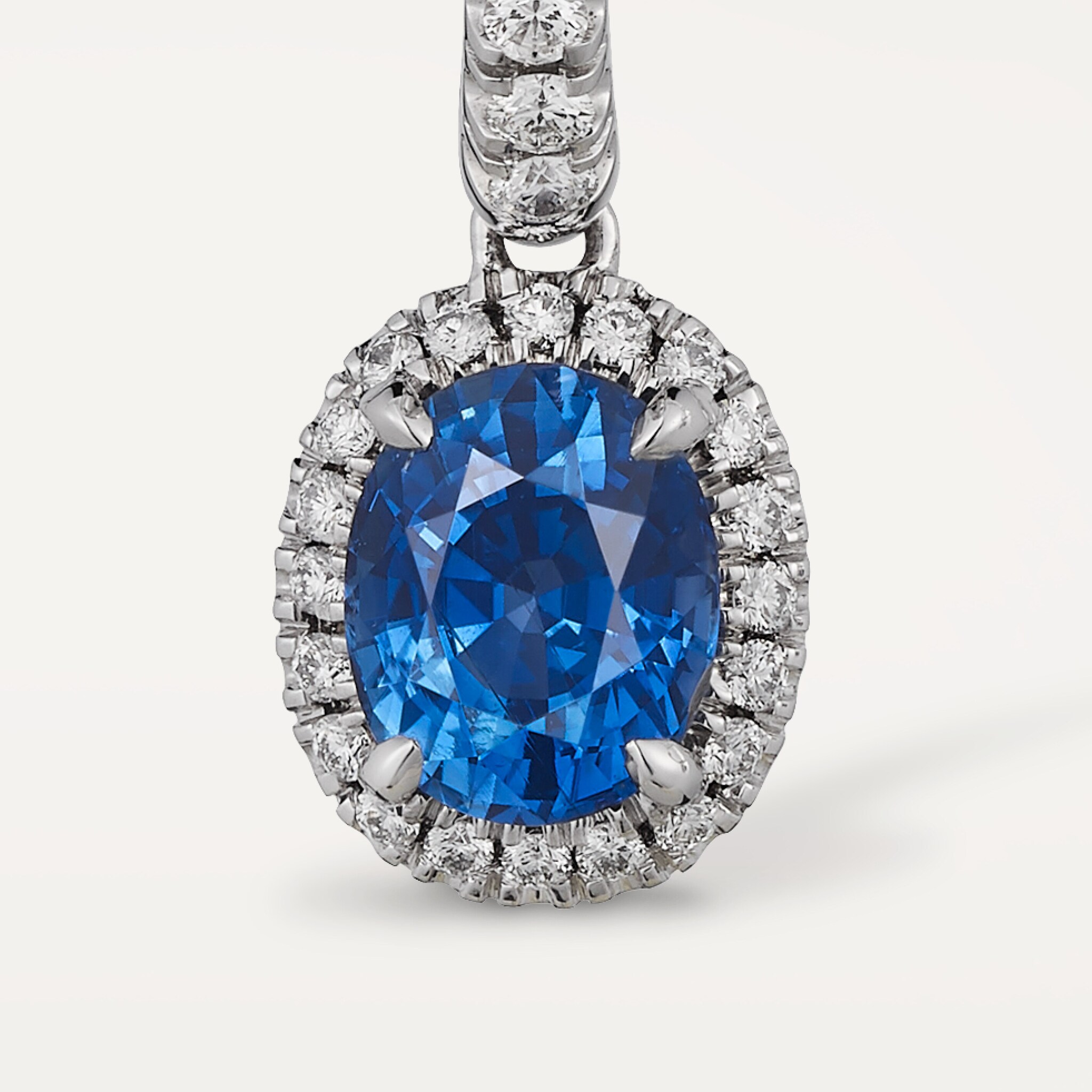 Cartier Destin&eacute;e sleeper earrings, 2 oval-cut sapphires, paved