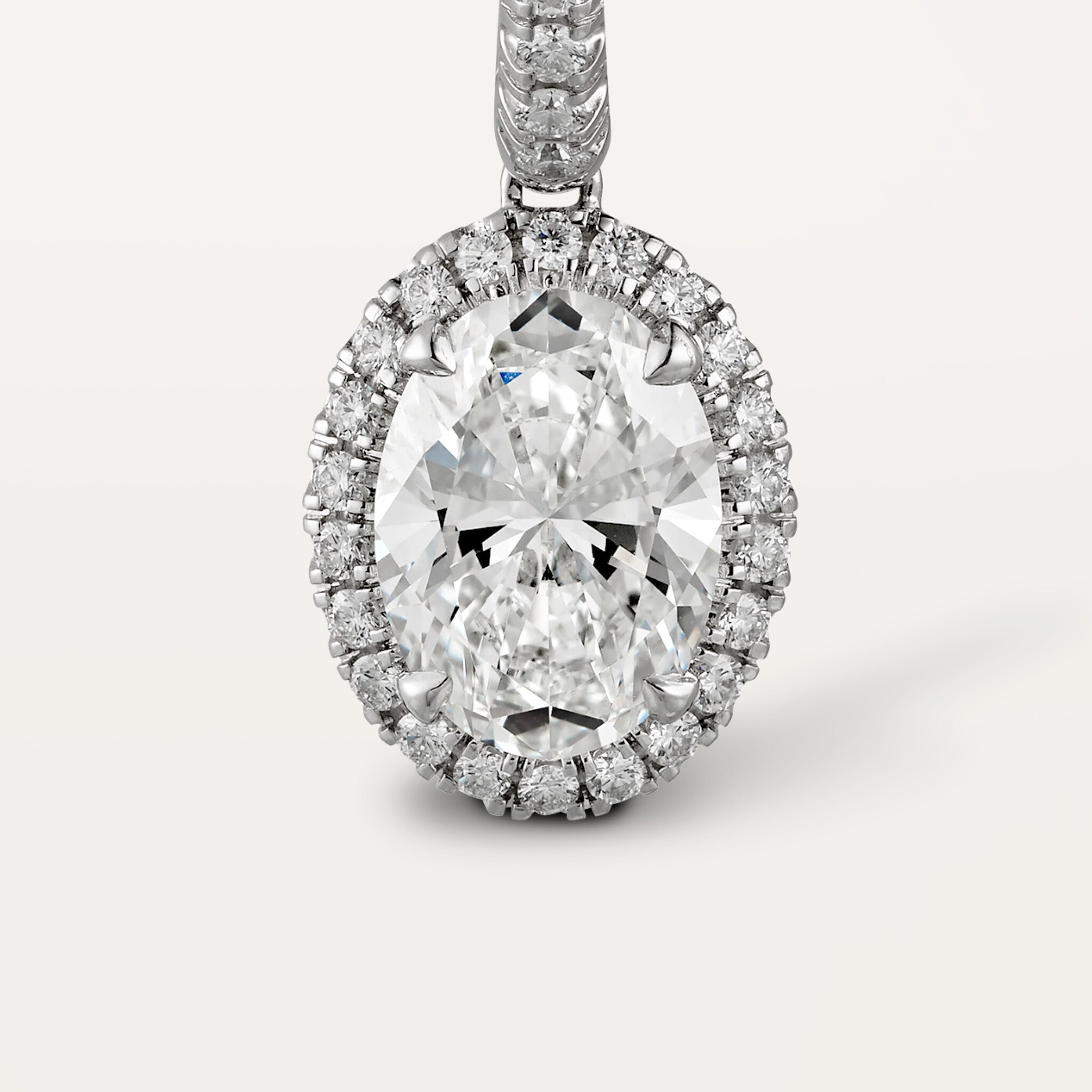 Cartier Destin&eacute;e sleeper earrings, 2 oval-cut diamonds, paved 