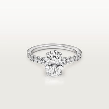 1895 solitaire, oval-cut diamond, paved  1895 solitaire, oval-cut diamond, paved