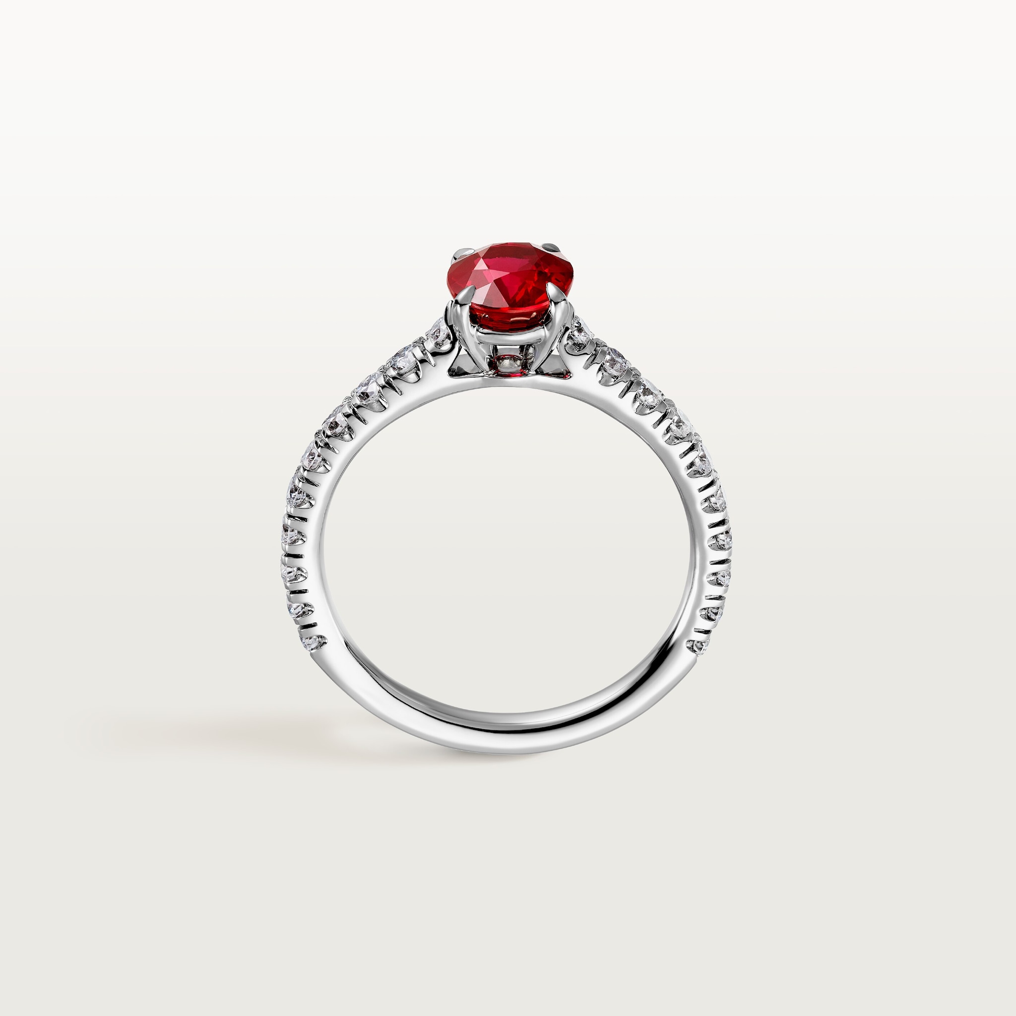1895 solitaire, oval-cut ruby, paved 