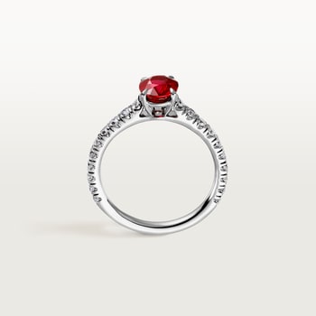 1895 solitaire, oval-cut ruby, paved  1895 solitaire, oval-cut ruby, paved