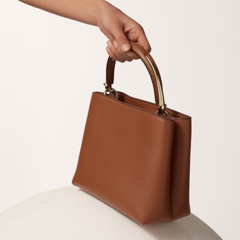 Small model handle bag, Panthère Double de Cartier Small model handle bag, Panthère Double de Cartier