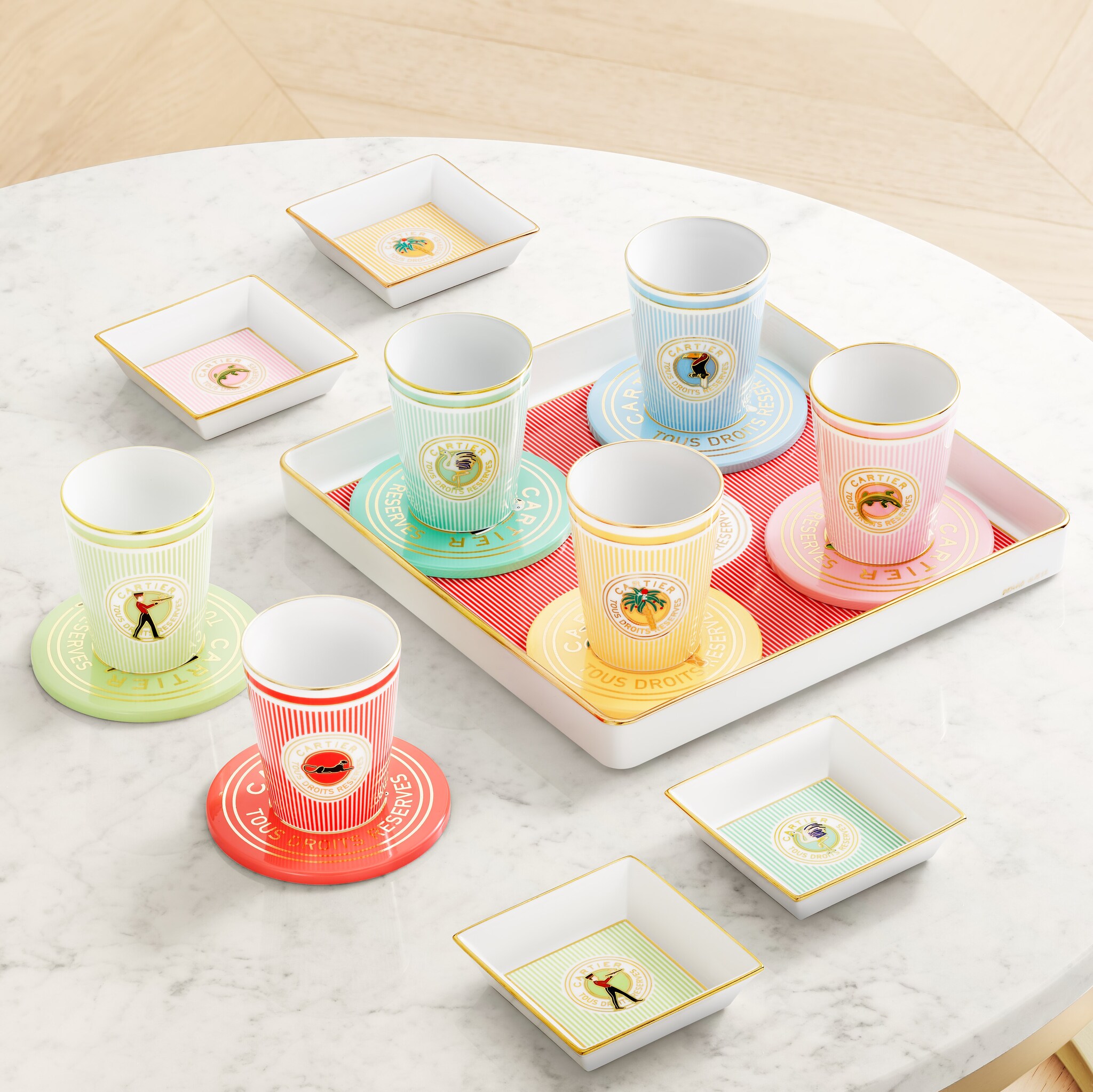 Set of six Cartier Characters coasters