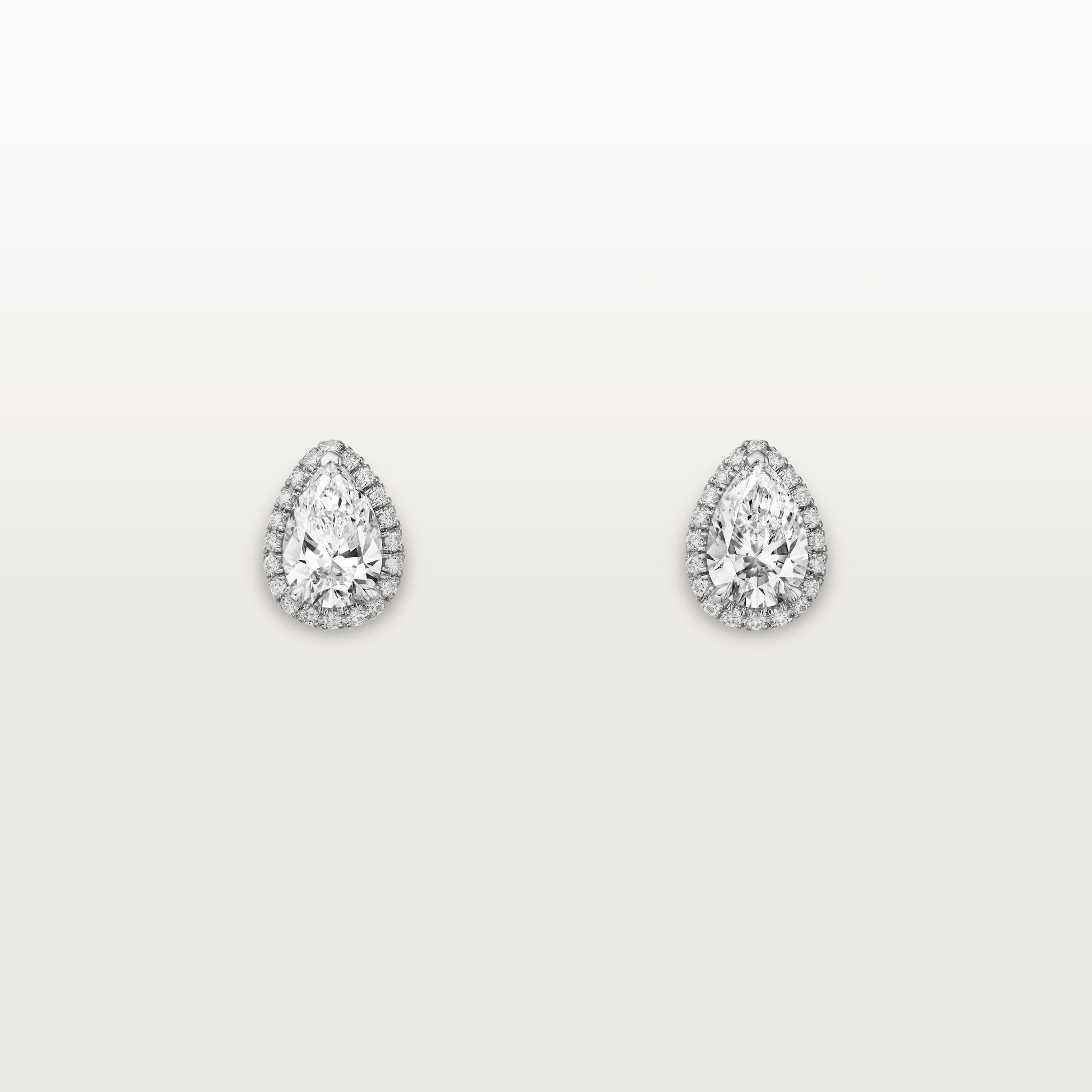 Cartier Destin&eacute;e stud earrings, 2 pear-shaped diamonds, paved