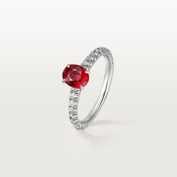 1895 solitaire, oval-cut ruby, paved  1895 solitaire, oval-cut ruby, paved