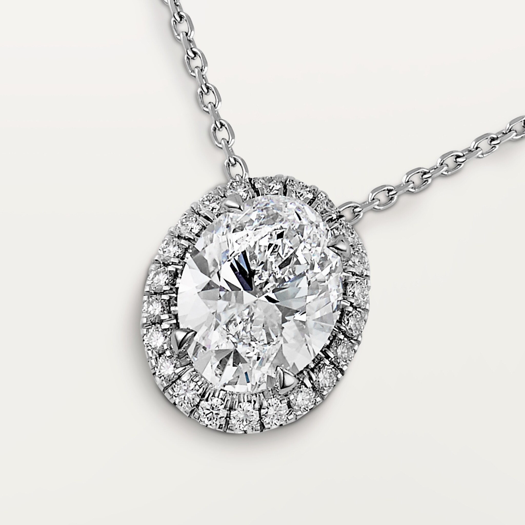 Cartier Destin&eacute;e pendant, oval-cut diamond, paved 