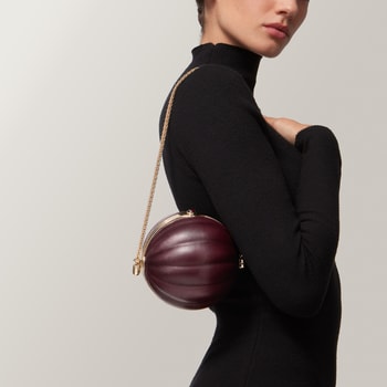 Round bag with gadroon motif, Cartier Soir Round bag with gadroon motif, Cartier Soir