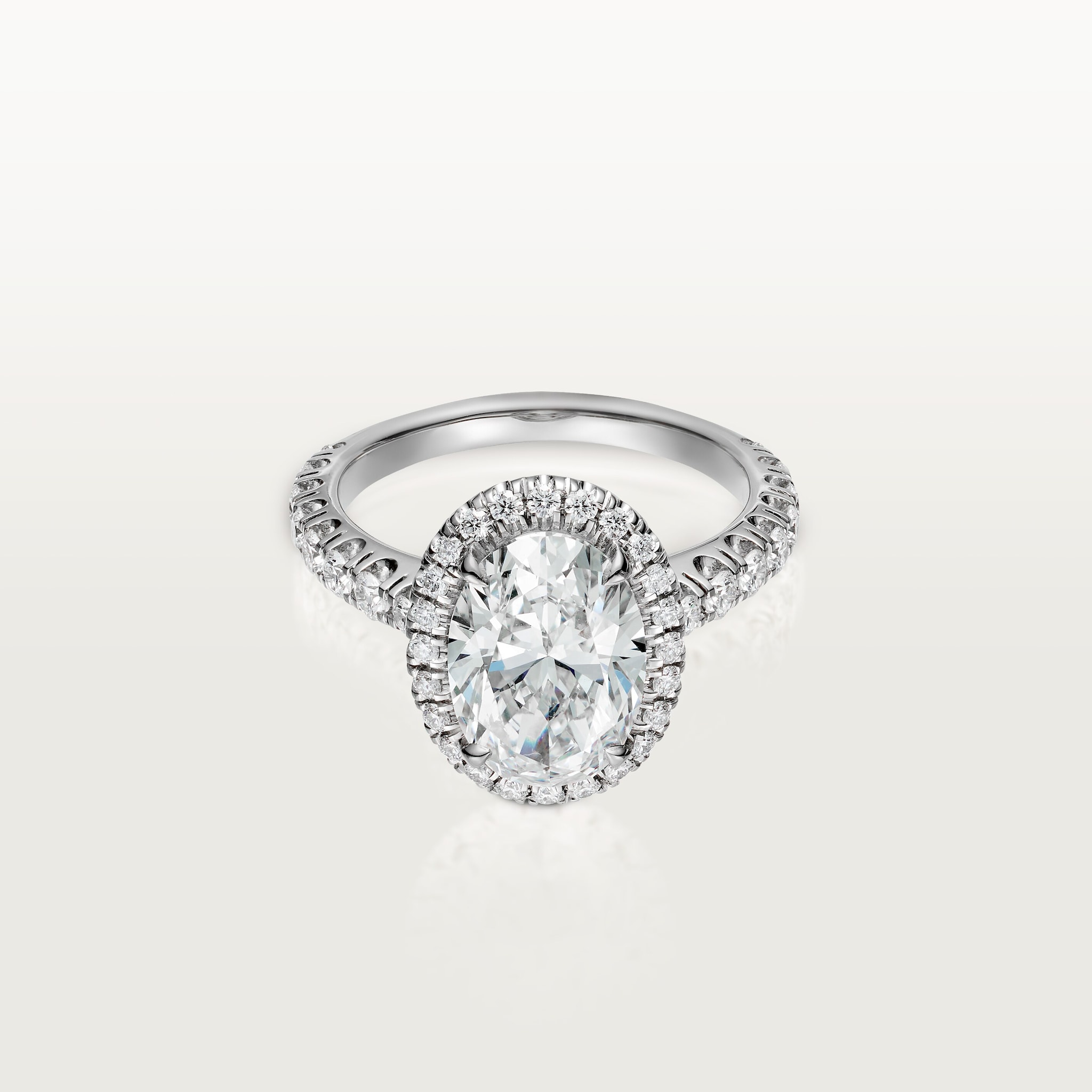 Cartier Destin&eacute;e solitaire, oval-cut diamond, paved 