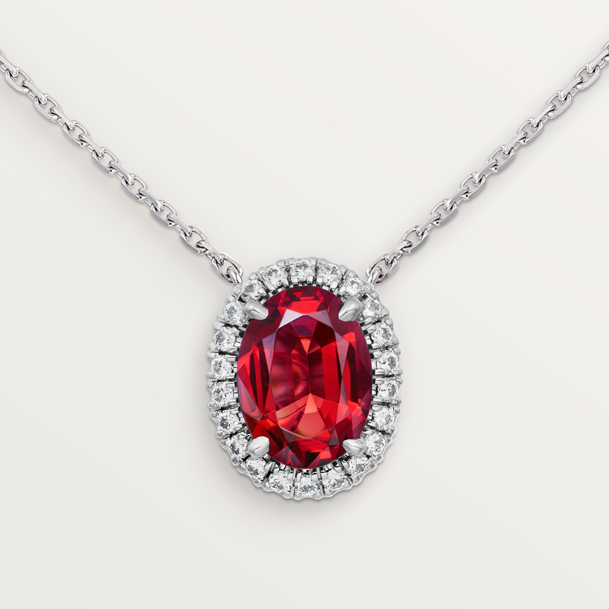 Cartier Destin&eacute;e pendant, oval-cut ruby, paved 