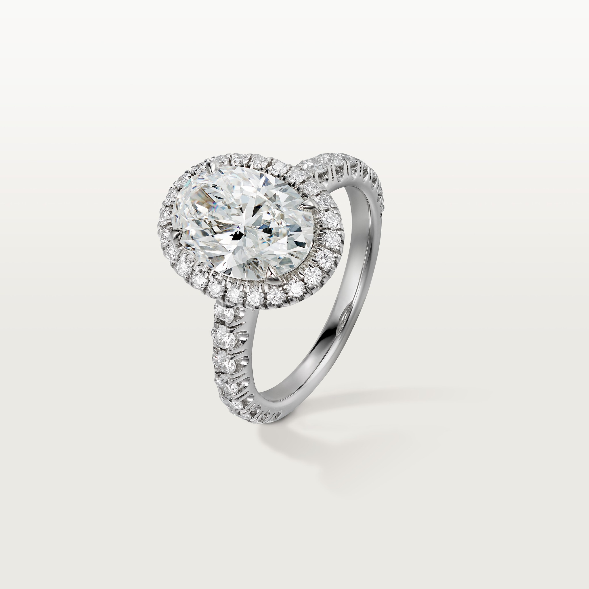 Cartier Destin&eacute;e solitaire, oval-cut diamond, paved 