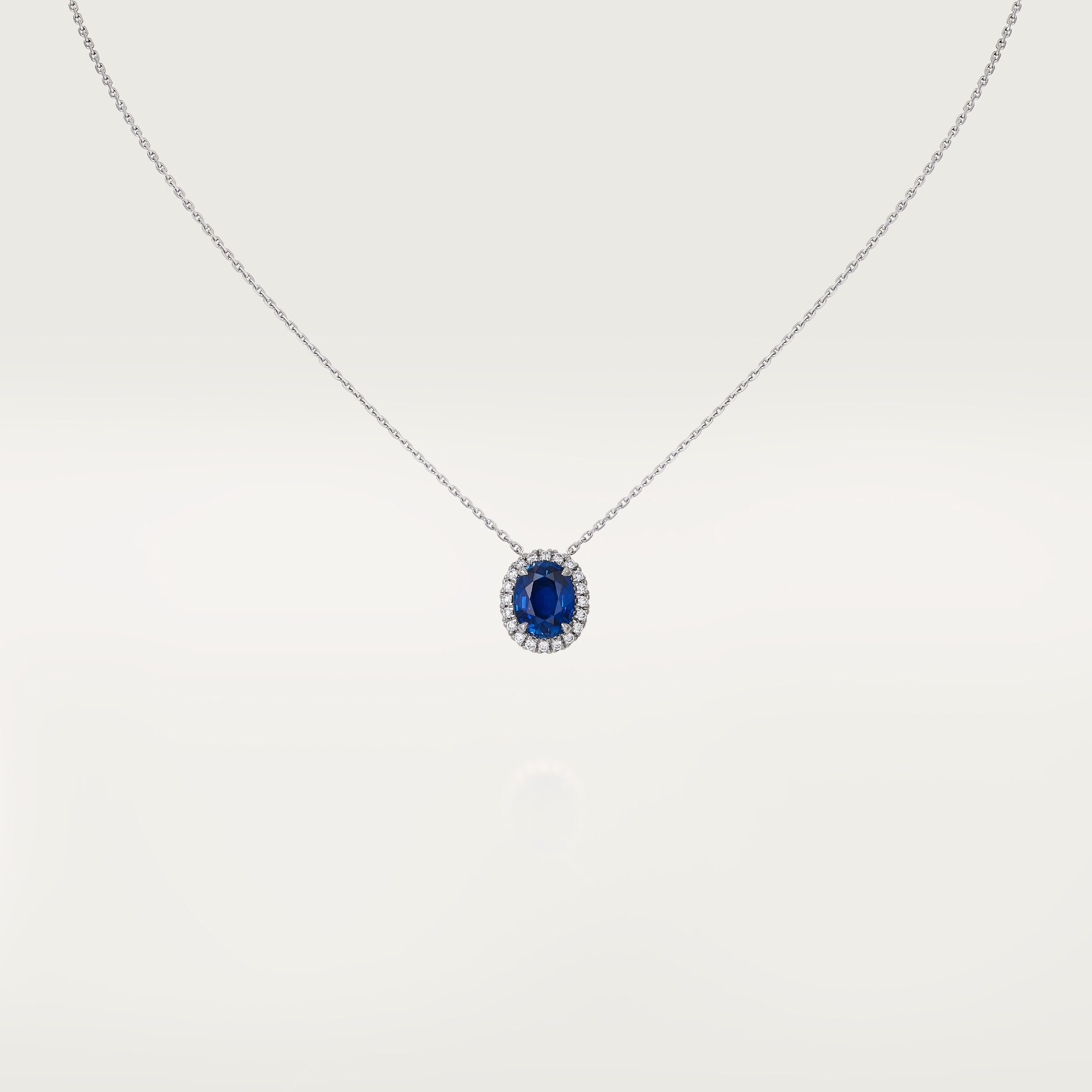 Cartier Destin&eacute;e pendant, oval-cut sapphire, paved 