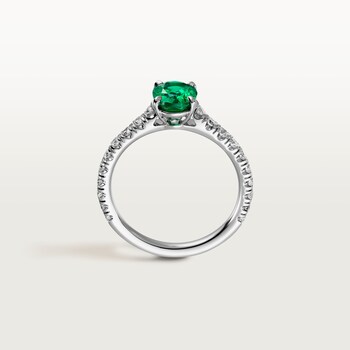 1895 solitaire, oval-cut emerald, paved  1895 solitaire, oval-cut emerald, paved