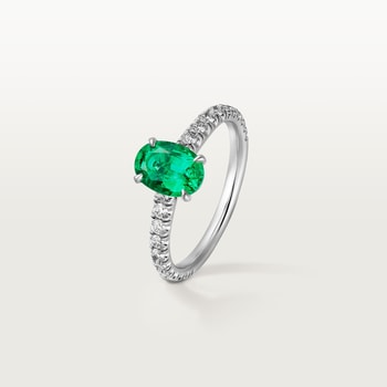 1895 solitaire, oval-cut emerald, paved  1895 solitaire, oval-cut emerald, paved