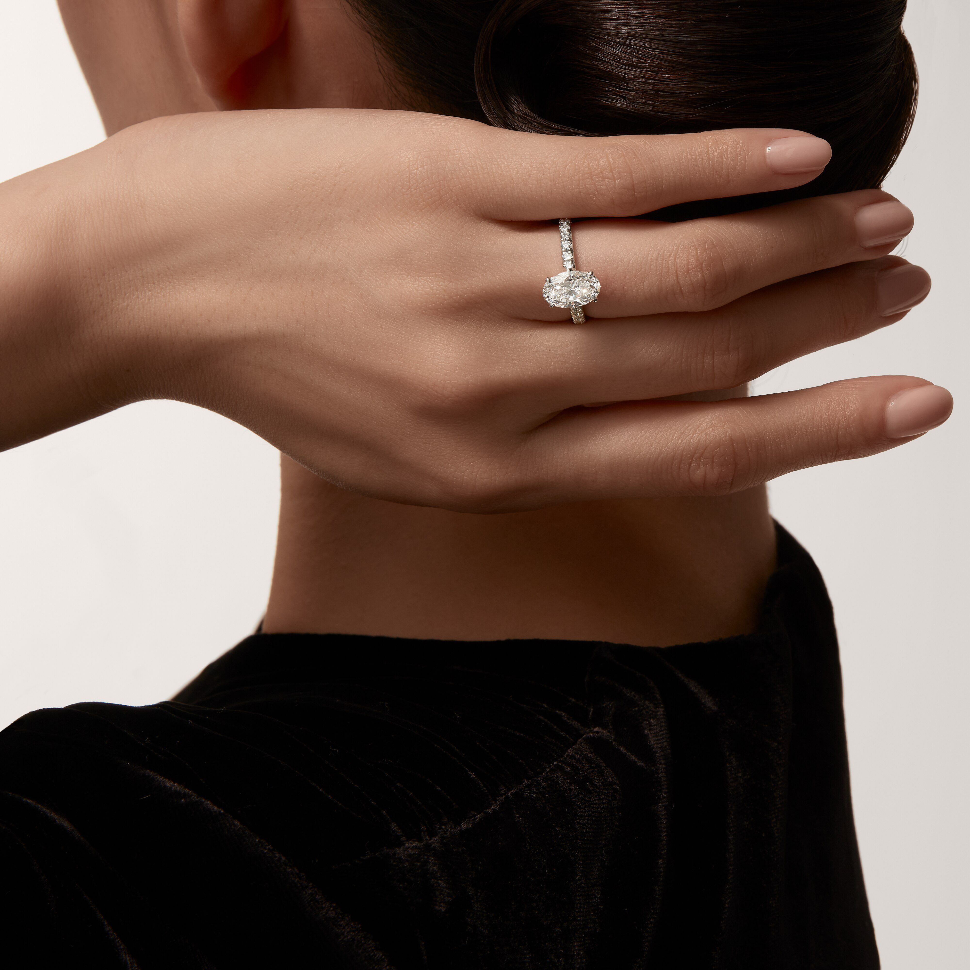 1895 solitaire, oval-cut diamond, paved