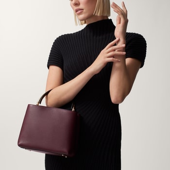 Small model handle bag, Panthère Double de Cartier Small model handle bag, Panthère Double de Cartier