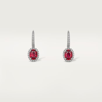 Cartier Destinée sleeper earrings, 2 oval-cut rubies, paved Cartier Destinée sleeper earrings, 2 oval-cut rubies, paved