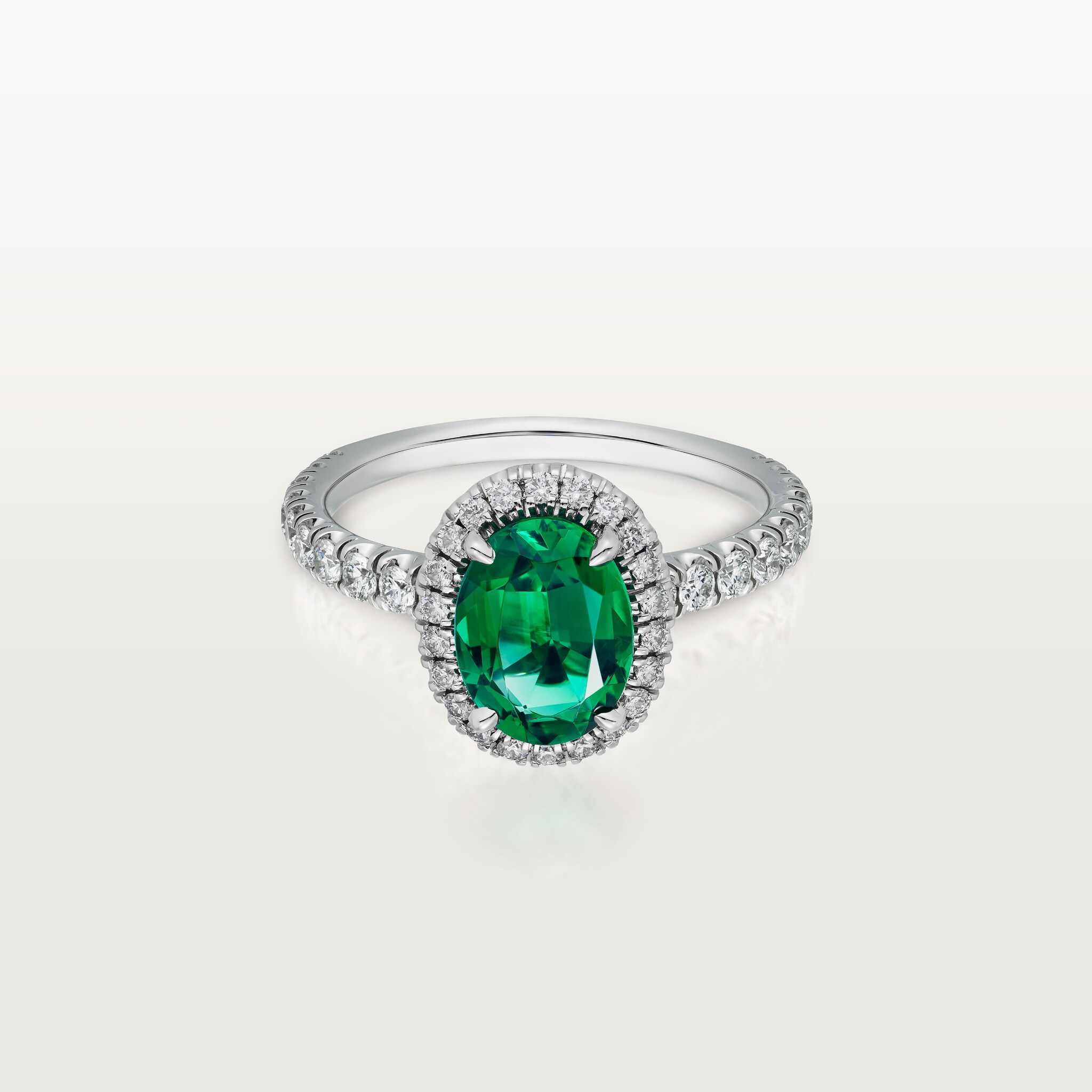 Cartier Destin&eacute;e solitaire, oval-cut emerald, paved 