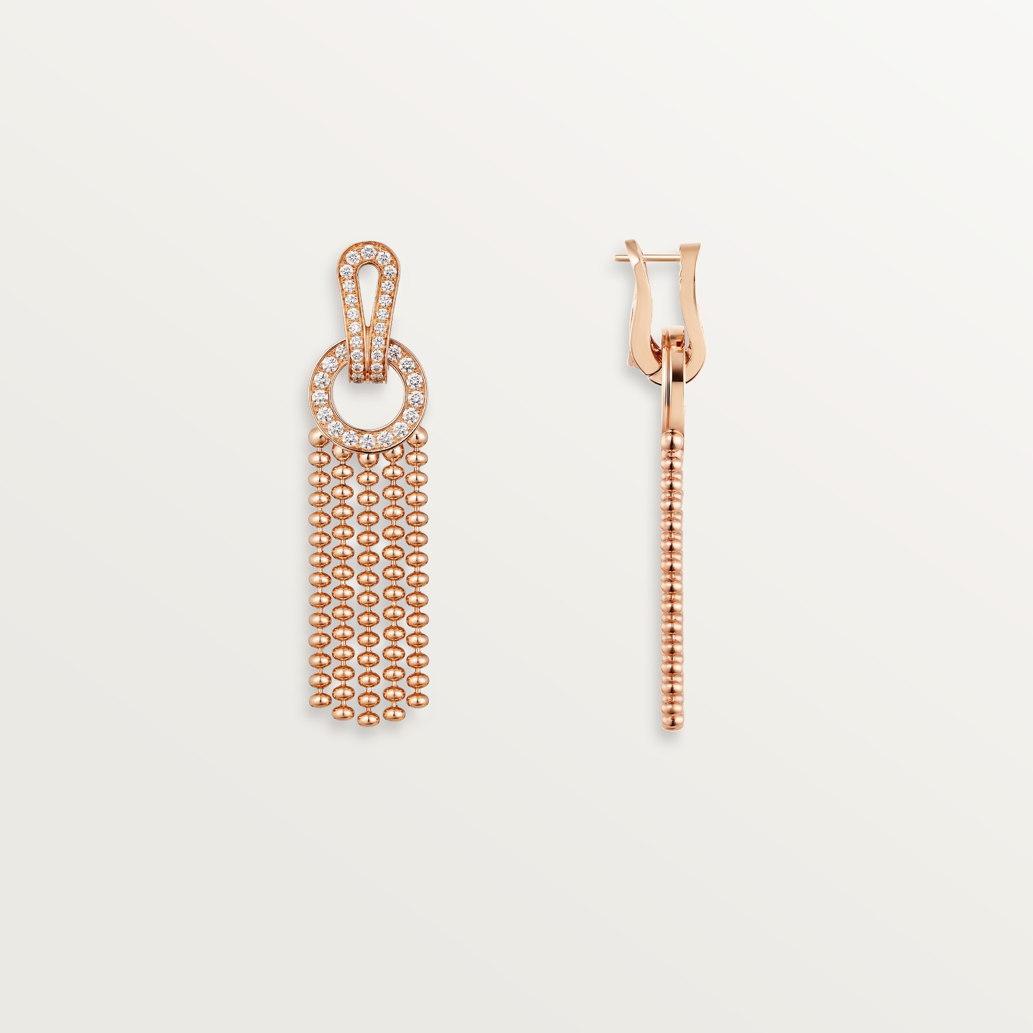Agrafe earrings, half-paved