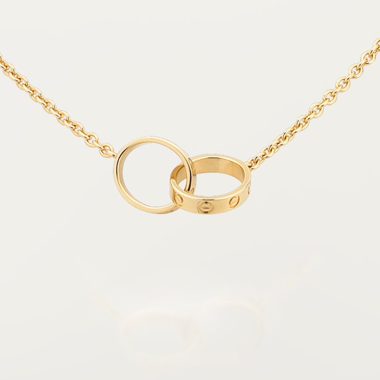 Cartier necklace two best sale rings