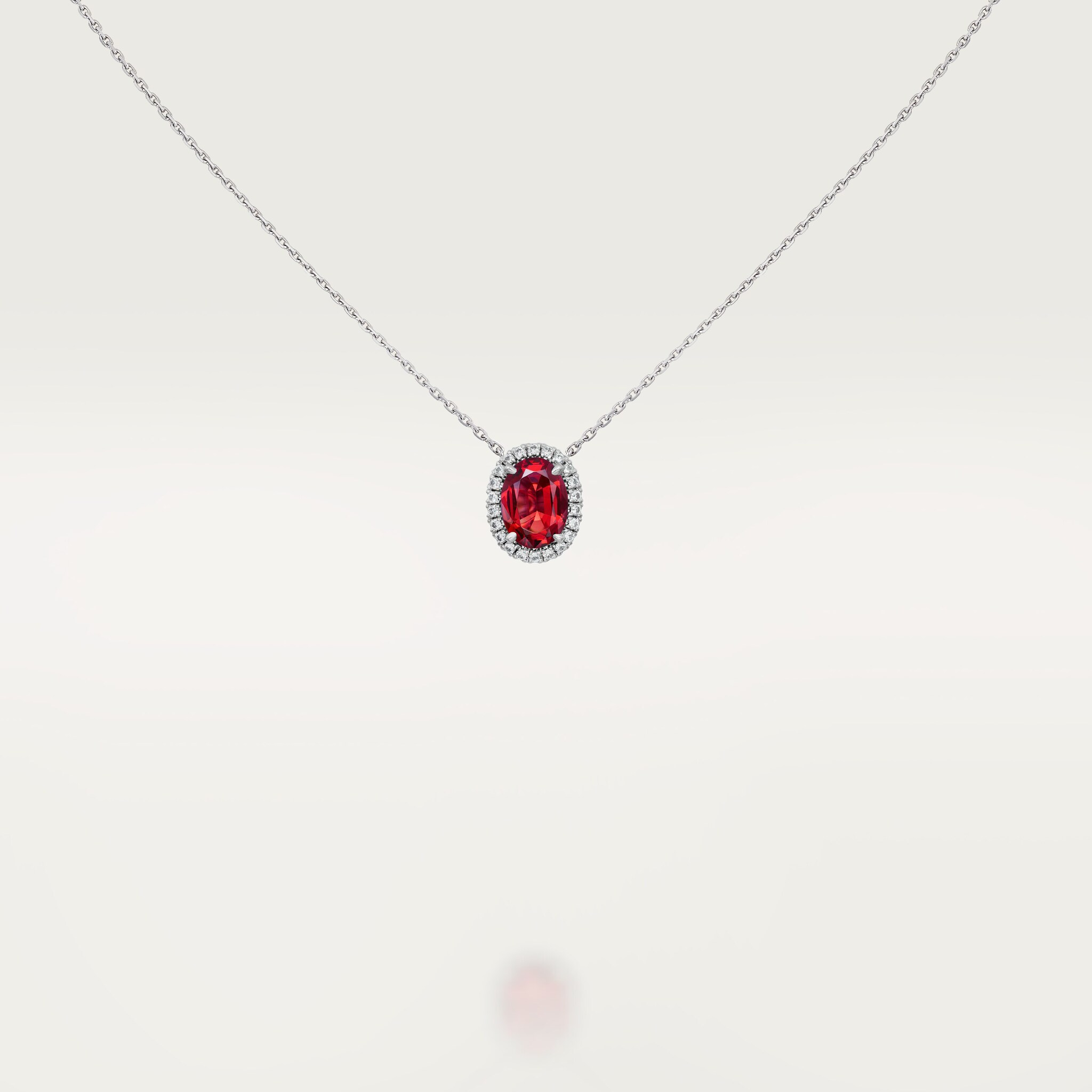 Cartier Destin&eacute;e pendant, oval-cut ruby, paved 
