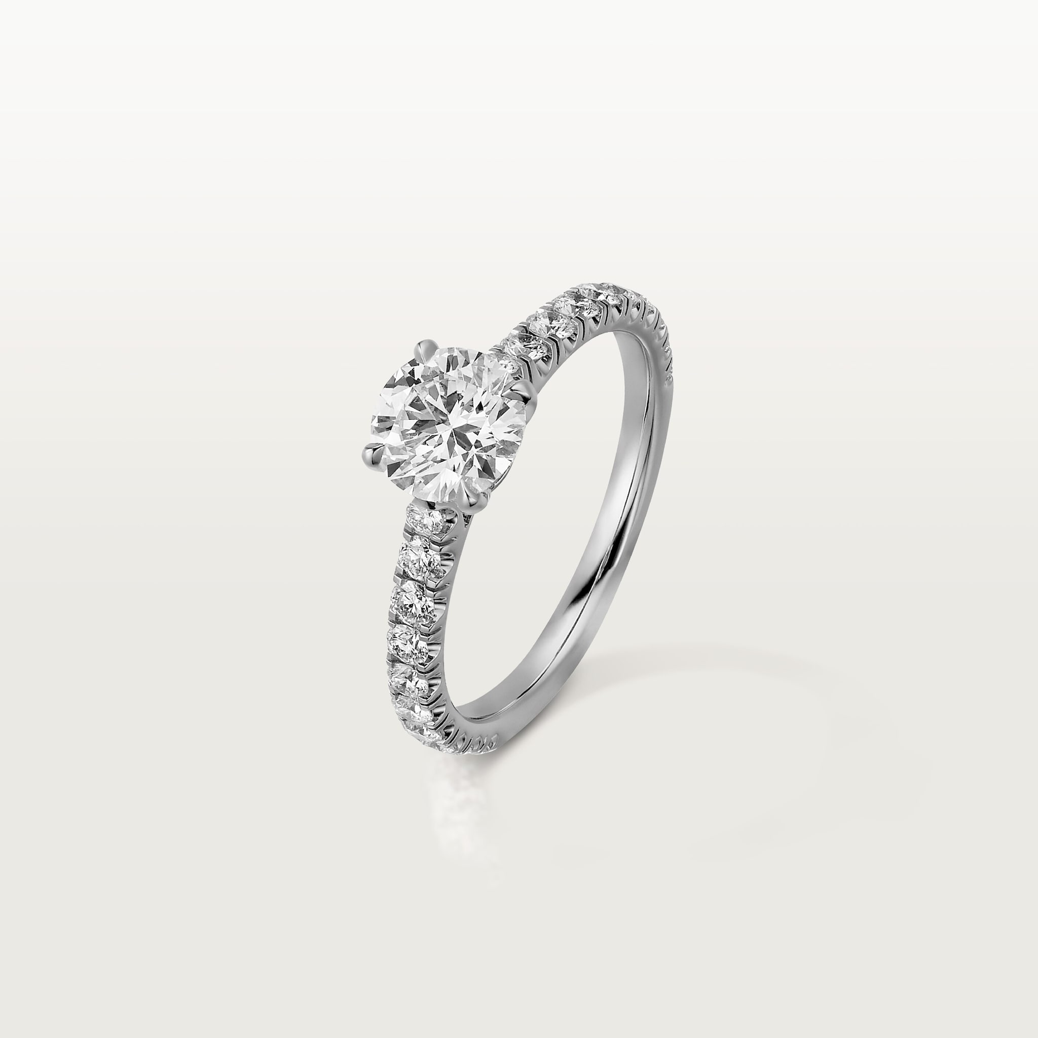 Solitaire 1895, diamant taille brillant, pav&eacute; 