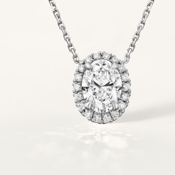 Cartier Destinée pendant, oval-cut diamond, paved  Cartier Destinée pendant, oval-cut diamond, paved