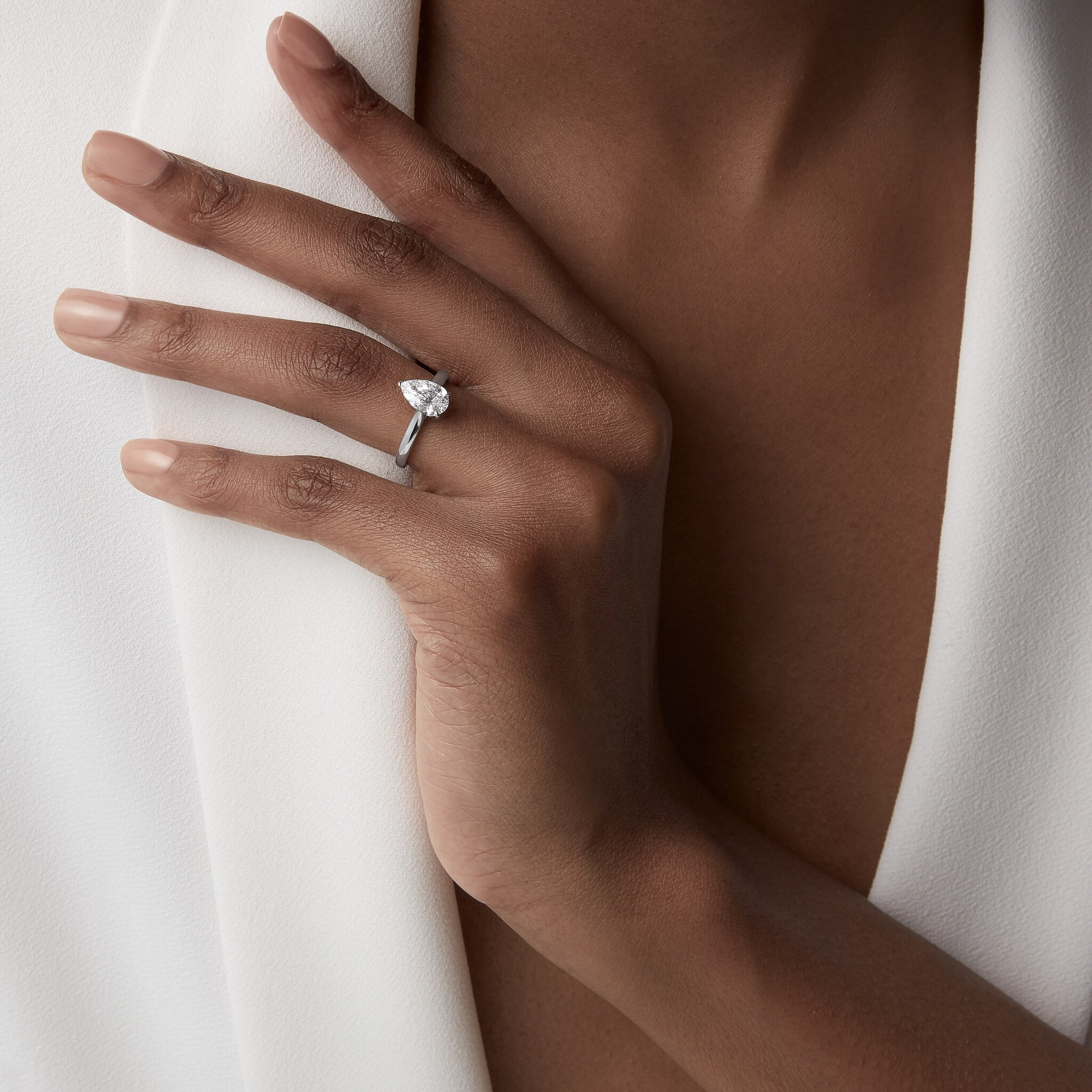 1895 solitaire, pear-shaped diamond