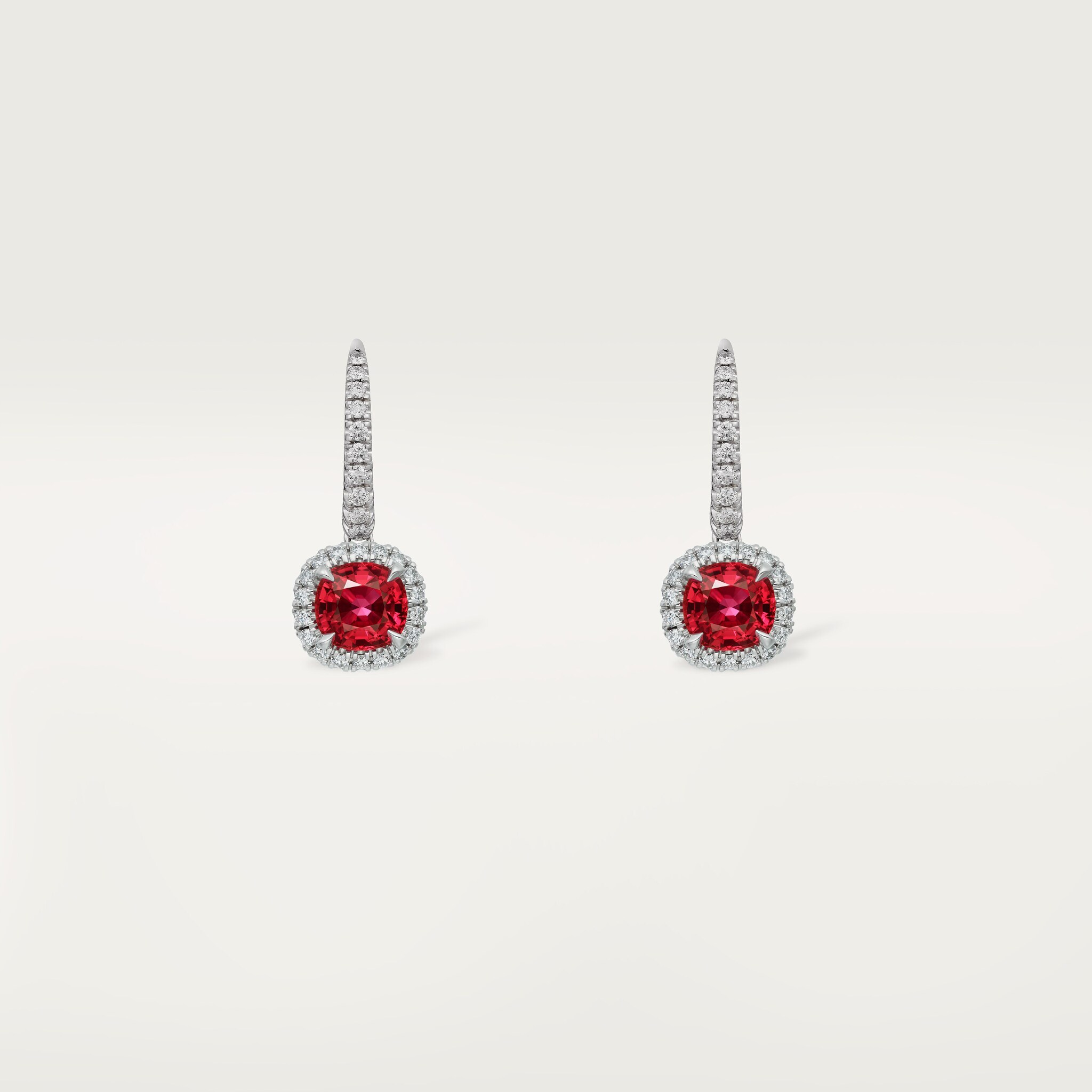 Cartier Destin&eacute;e sleeper earrings, 2 cushion-cut rubies, paved