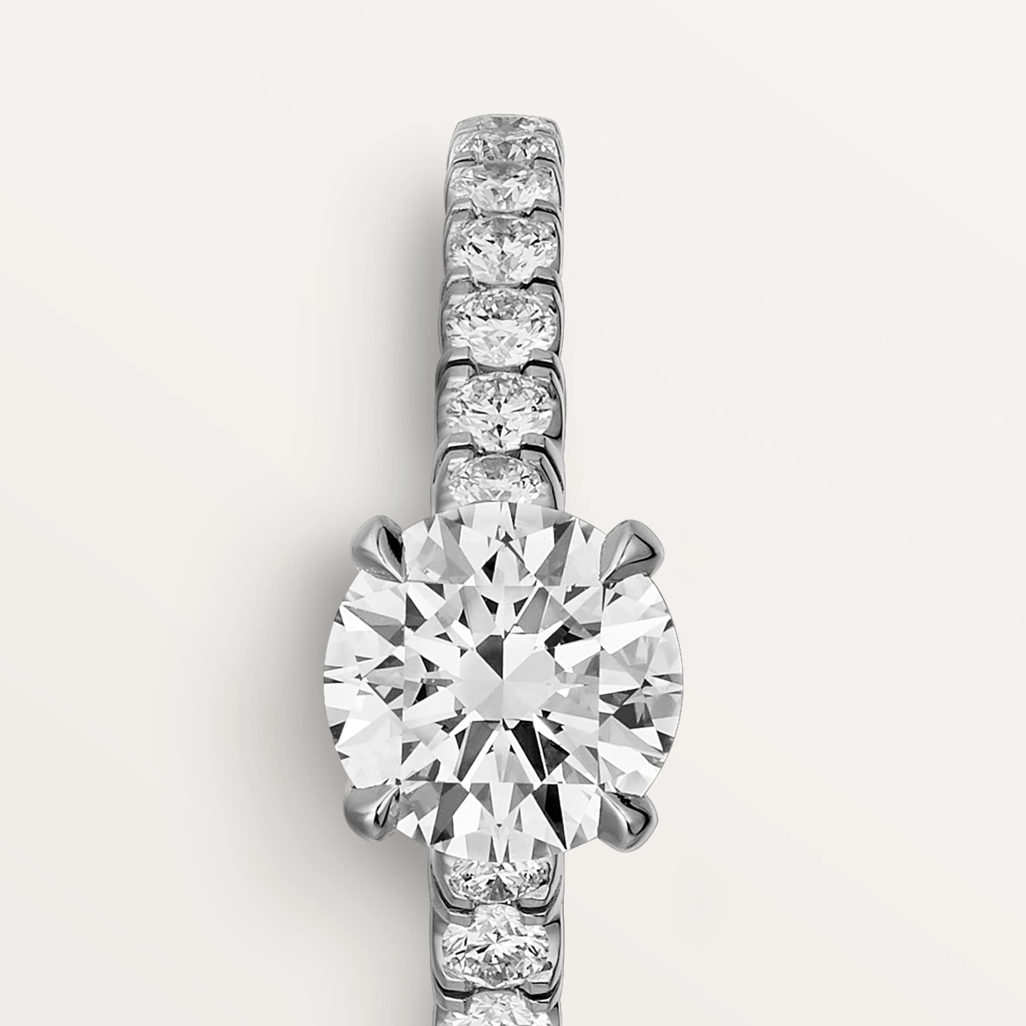 Solitaire 1895, diamant taille brillant, pav&eacute; 