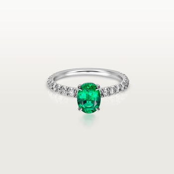 1895 solitaire, oval-cut emerald, paved  1895 solitaire, oval-cut emerald, paved