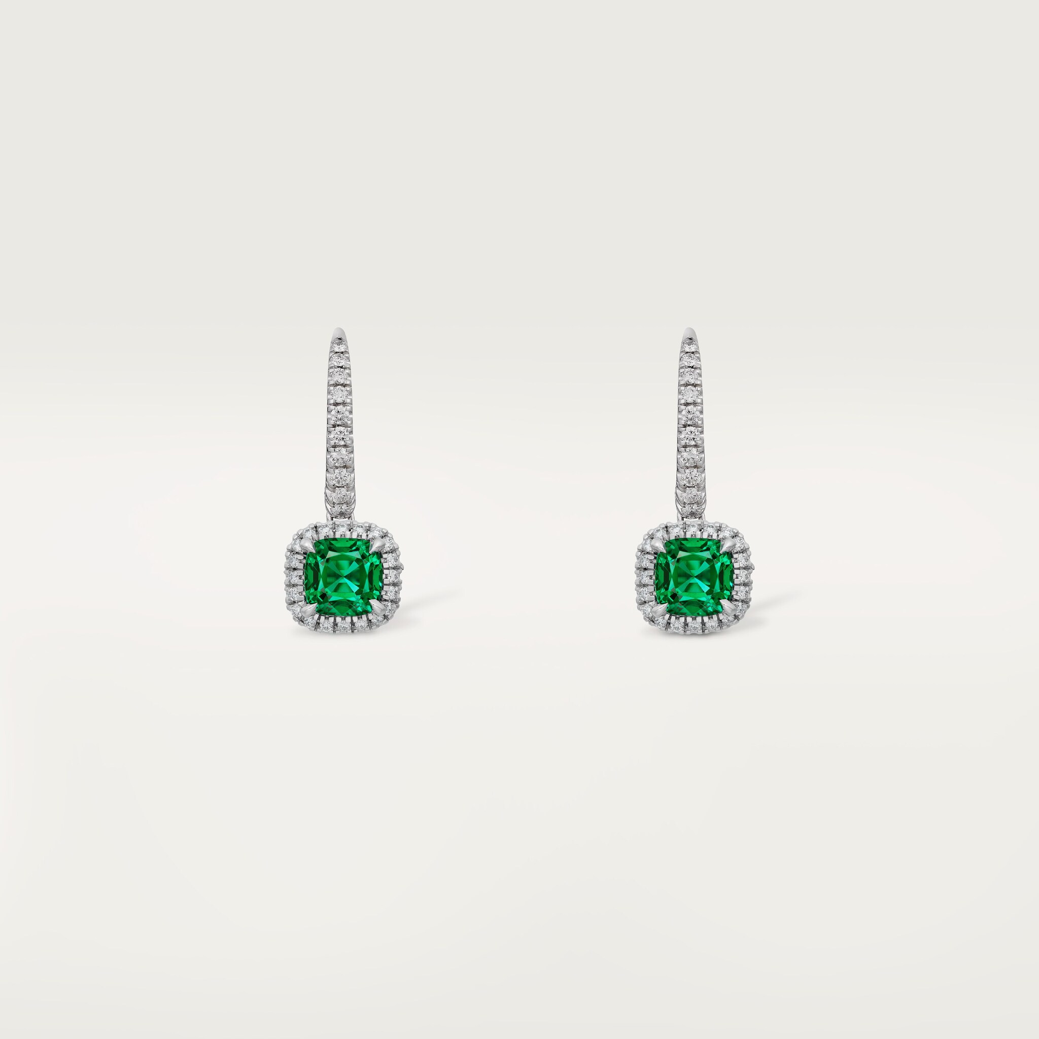 Cartier Destin&eacute;e sleeper earrings, 2 cushion-cut emeralds, paved 