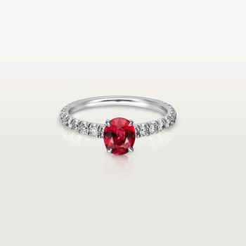 1895 solitaire, oval-cut ruby, paved  1895 solitaire, oval-cut ruby, paved