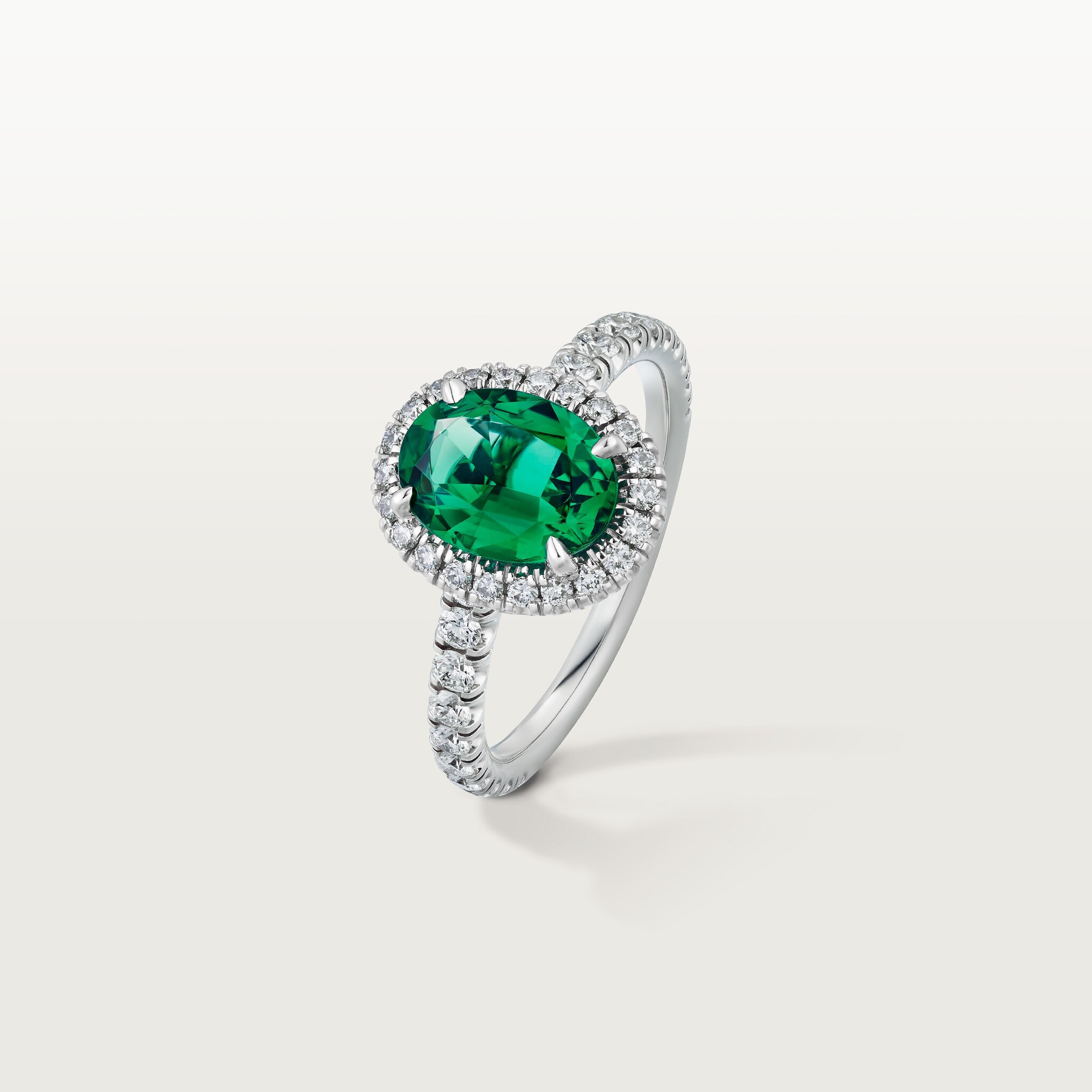 Cartier Destin&eacute;e solitaire, oval-cut emerald, paved 
