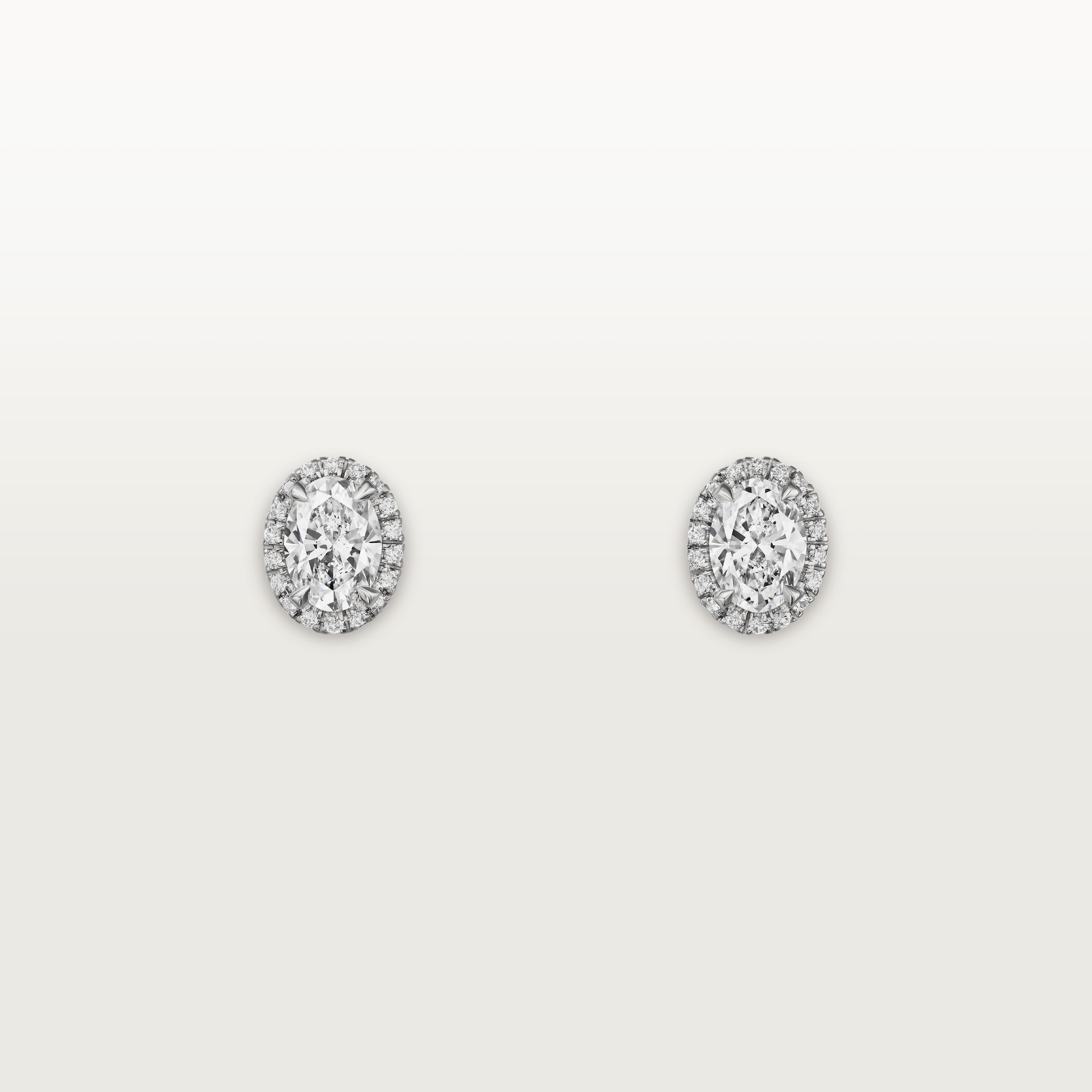 Cartier Destin&eacute;e stud earrings, 2 oval-cut diamonds, paved